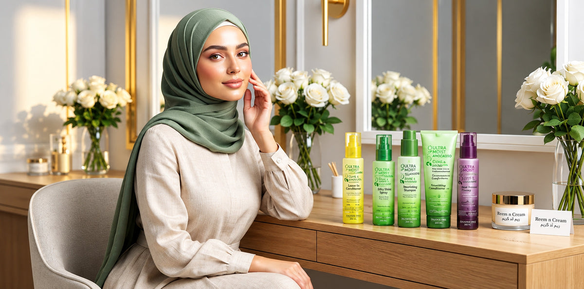Elegant woman in a sage hijab beside premium hair and skincare products, showcasing a refined reemncream beauty display look.