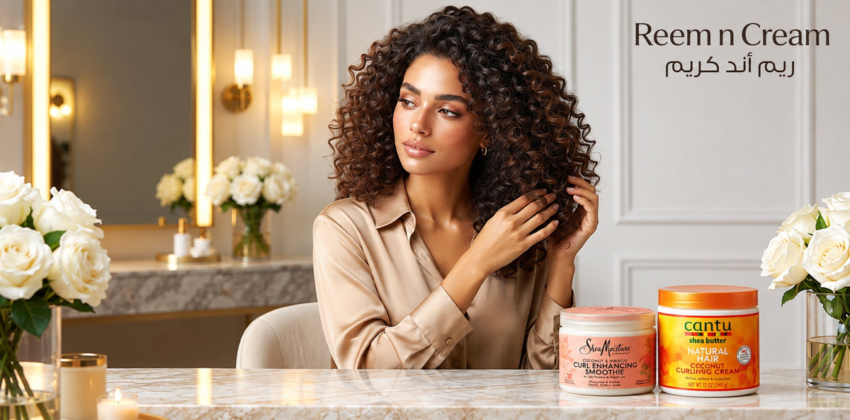 Reem n Cream beauty image featuring a woman with curly hair and SheaMoisture and Cantu curl care products.