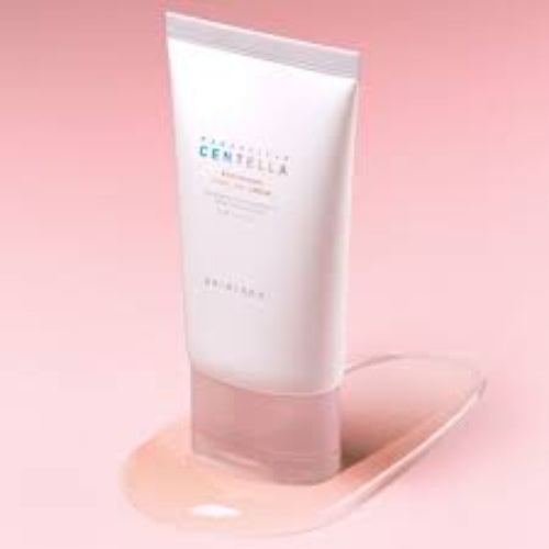SKIN1004 Madagascar Centella Poremizing Light Gel Cream tube with a swipe of peach-toned cream on pink background.